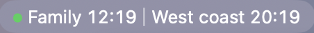 Development preview: a green dot marks the local Family clock in the real Mac menu bar.